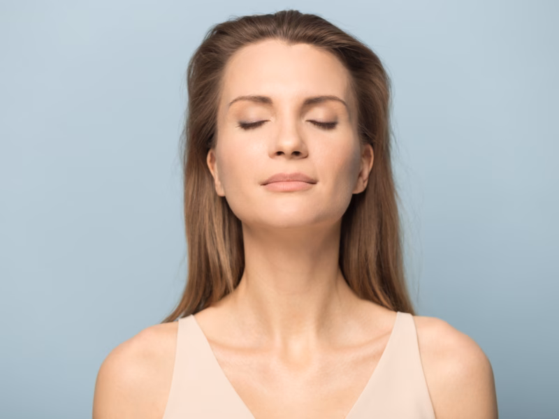 Woman in her forties breathing fresh air thanks to her energy recovery ventilator (ERV)