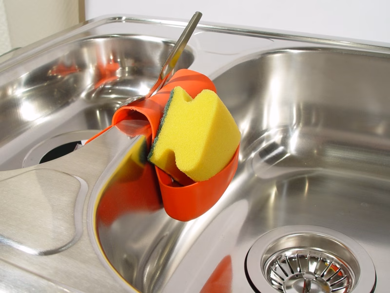 Modern stainless steel sink with garbage disposal