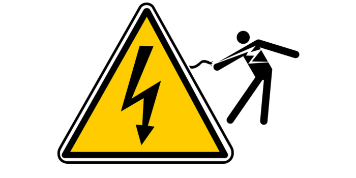 Person being shocked by Electricity Danger Warning sign.