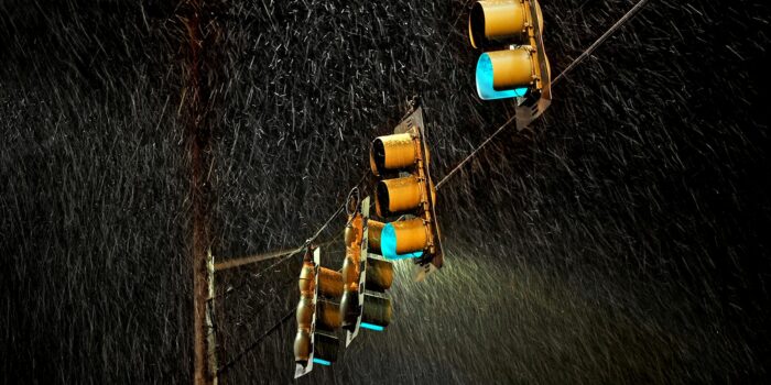 Stoplights sway during a bad storm in Charlottesville, Virginia.